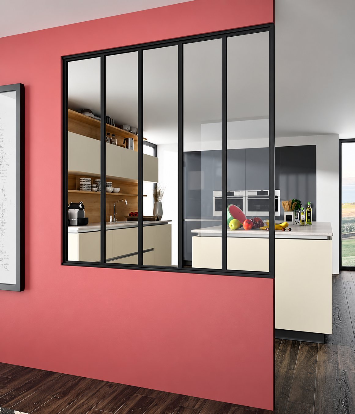 Verrière d’atelier à cadre noir percée dans un mur rose, qui donne sur une cuisine moderne beige avec un îlot central